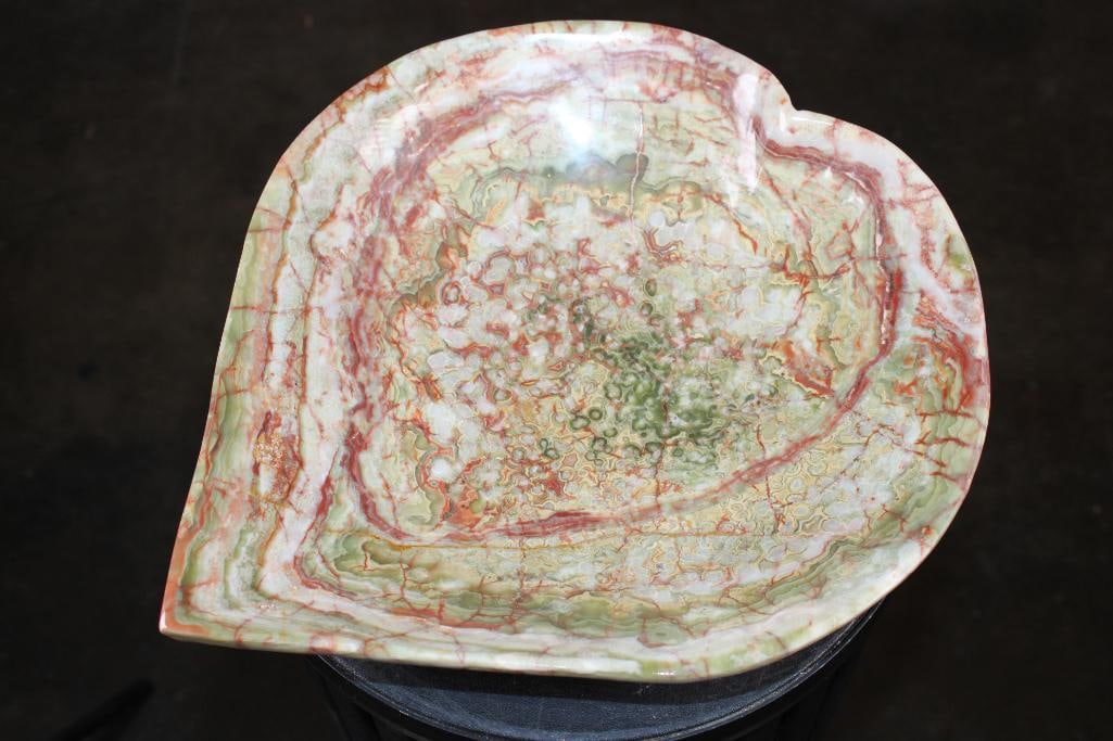 Big Heart Shaped Bowl Carved from a single piece of BANDED ONYX: Big Beautiful BANDED ONYX Heart Shaped Bowl. It measures 13.75" Long x 13.75" Wide x 3" Tall and the Total Weight is 8.55 lbs. Banded onyx is a naturally banded stone valued for its visual appeal and