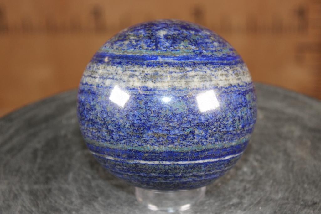 Big Polished BLUE LAPIS LAZULI Mineral Sphere, Weight: 4 lbs: Big Formed and Polished BLUE LAPIS LAZULI Mineral Sphere. It measures 4 3/8" in Diameter and the Total Weight is 4 lbs 12 oz. Lapis Lazuli is a deep blue metamorphic rock used as a semi-precious