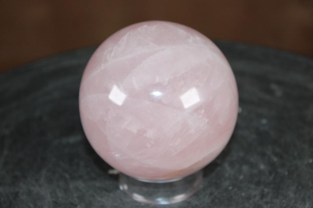 Polished ROSE QUARTZ Mineral Sphere, Weight: 1 lb: Formed and Polished ROSE QUARTZ Mineral Sphere. It measures 3 1/8" in Diameter and the Total Weight is 1 lb 12 oz. It comes with a plastic ring stand for display. Rose Quartz is known as the "love