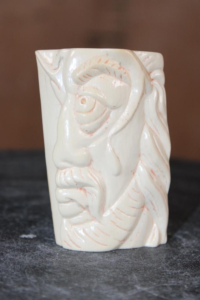 Guillermo Leal, Carved Fossilized MAMMOTH IVORY TUSK of Jesus Christ: Guillermo Leal, Carved Fossilized MAMMOTH Ivory TUSK of Jesus Christ with Head, Thorns, and Blood Drip. It measures 3" Tall x 2" Wide x 5/8" Thick and Weighs 1 oz. It is Signed by Guillermo Leal