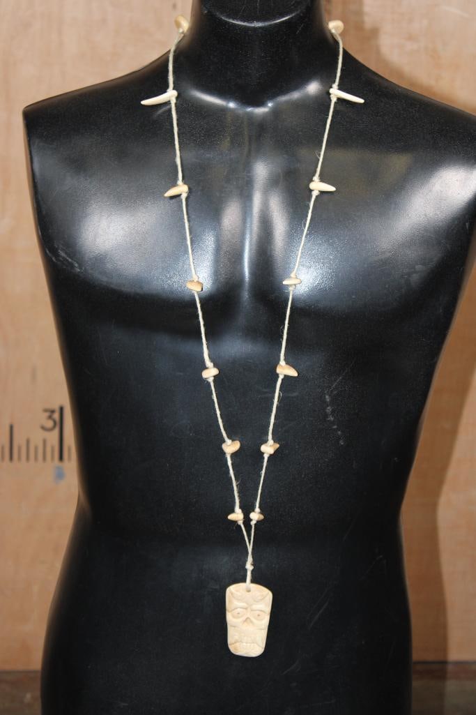 Guillermo Leal, Asian Style Fossilized MAMMOTH IVORY TUSK Carved Hannya Skull Pendant Necklace with: Guillermo Leal, Asian Style Fossilized MAMMOTH IVORY TUSK Carved Hannya Skull Pendant Necklace. There are 15 Carved Fossilized Mammoth Tusk Teeth and Beads. The Hannya Skull Pendant measures 2