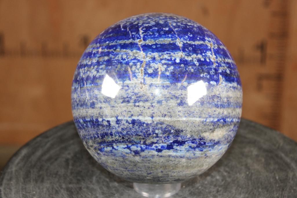 XL Polished BLUE LAPIS LAZULI Mineral Sphere, Weight: 12 lbs: XL Formed and Polished BLUE LAPIS LAZULI Mineral Sphere. It measures 6" in Diameter and the Total Weight is 12 lbs 12 oz. Lapis Lazuli is a deep blue metamorphic rock used as a semi-precious