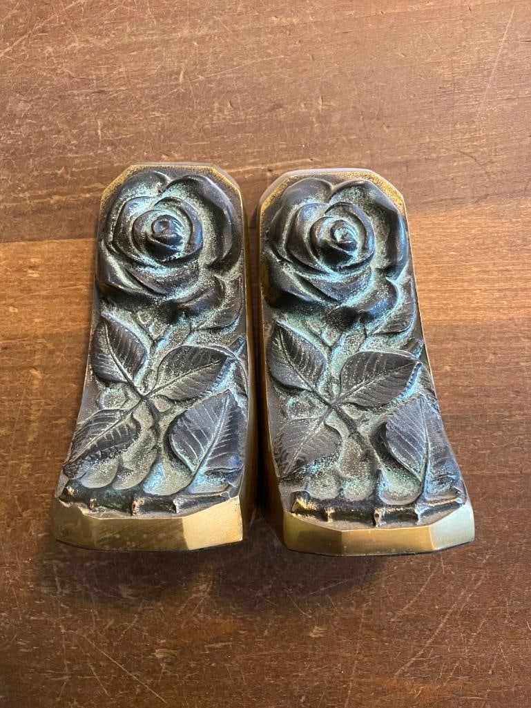 Pair of Solid Brass BOOKENDS with a Rose Bloom Design: Lovely Pair of Solid Brass BOOKENDS with a Rose Bloom Design. They measure 6" Tall x 3" Deep x 2.75" Wide and the Total Weight is 5 lbs. Perfect for unique decor. DECORATIVE BOOKENDS 