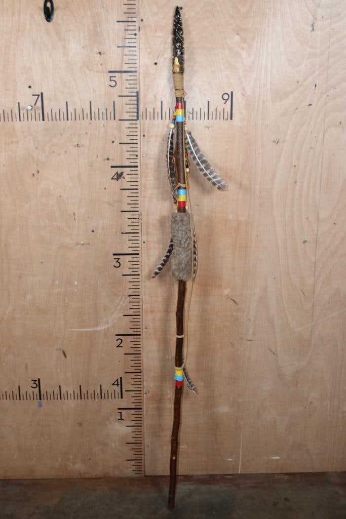 Native American Style Ceremonial STAFF or DANCE STICK with a Hand-knapped Stone Point: Native American Style Ceremonial STAFF or DANCE STICK with a Hand-knapped Stone Point. It measures 68" Tall and is embellished with Turkey Feathers, Leather wrapping, an obsidian style point, and