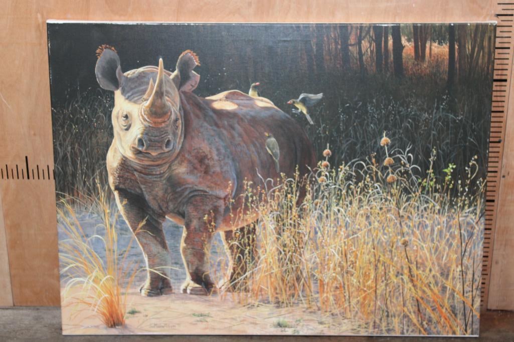 RHINOCERAS Canvas Print Signed and Numbered by Jan Martin McGuire: RHINOCERAS Canvas Print Signed and Numbered #1/32 by Jan Martin McGuire. It measures 40" Wide x 30" Tall. There are some minor scuffs around the edge. WILDLIFE ART 