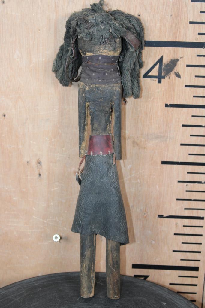 Hand-carved Wood Fertility DOLL from the Turkana People of Africa: Old Hand-carved Wood Fertility DOLL from the Turkana People. It is embellished with Leather and metal and measures 13.5" Tall x 2.25" Wide x 1.25" Depth. The Turkana people live in northwestern