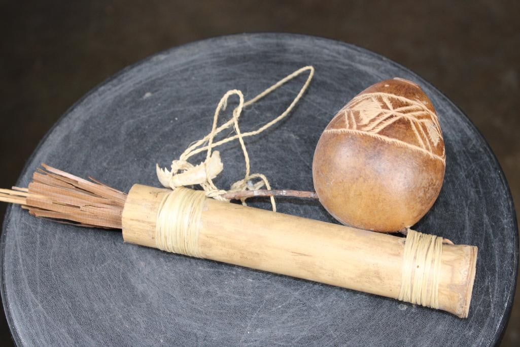 Traditional African QUIVER and Gourd with a Piranha Jaw: Traditional African QUIVER and Gourd with a Piranha Jaw. The Quiver is made from a Bamboo tube. The Gourd is for poison material or kapok fibers for wadding. They are used by the indigenous tribes