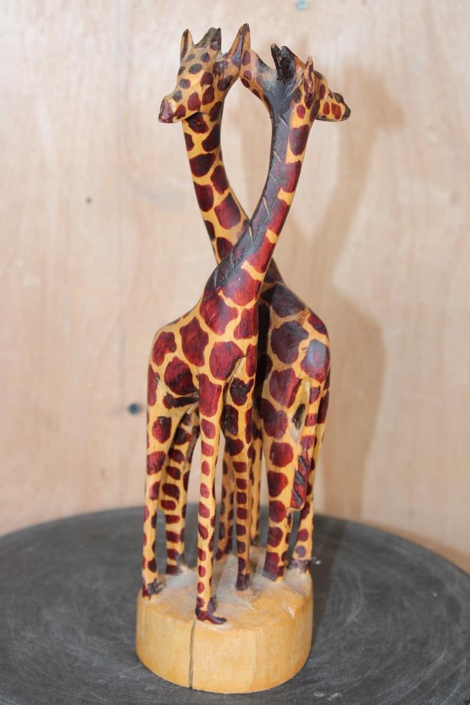 Hand-carved Wood GIRAFFE Sculpture: Hand-carved Wood GIRAFFE Sculpture. It measures 12" Tall x 3 3/8" Diameter (at Base). There is a crack in the base and it has a very minor chip on one ear. COLLECTIBLE AFRICAN ART 