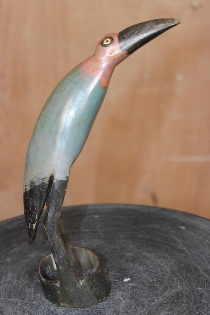 Hand-carved Cow or Ox Horn BIRD Sculpture from Zimbabwe: Hand-carved and Polished Cow or Ox Horn BIRD Sculpture from Zimbabwe. It measures 9" Tall and appears to be a stylized water bird such as a heron or and egret. DECORATIVE AFRICAN ART 