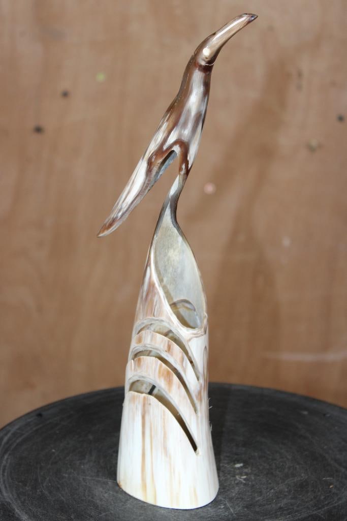 Mid-Century Hand-carved and Polished Steer Horn BIRD SCULPTURE: Mid-Century Hand-carved and Polished Steer Horn Heron or BIRD SCULPTURE. It measures 12 1/8" Tall and has an integrated base. COLLECTIBLE AFRICAN ART 
