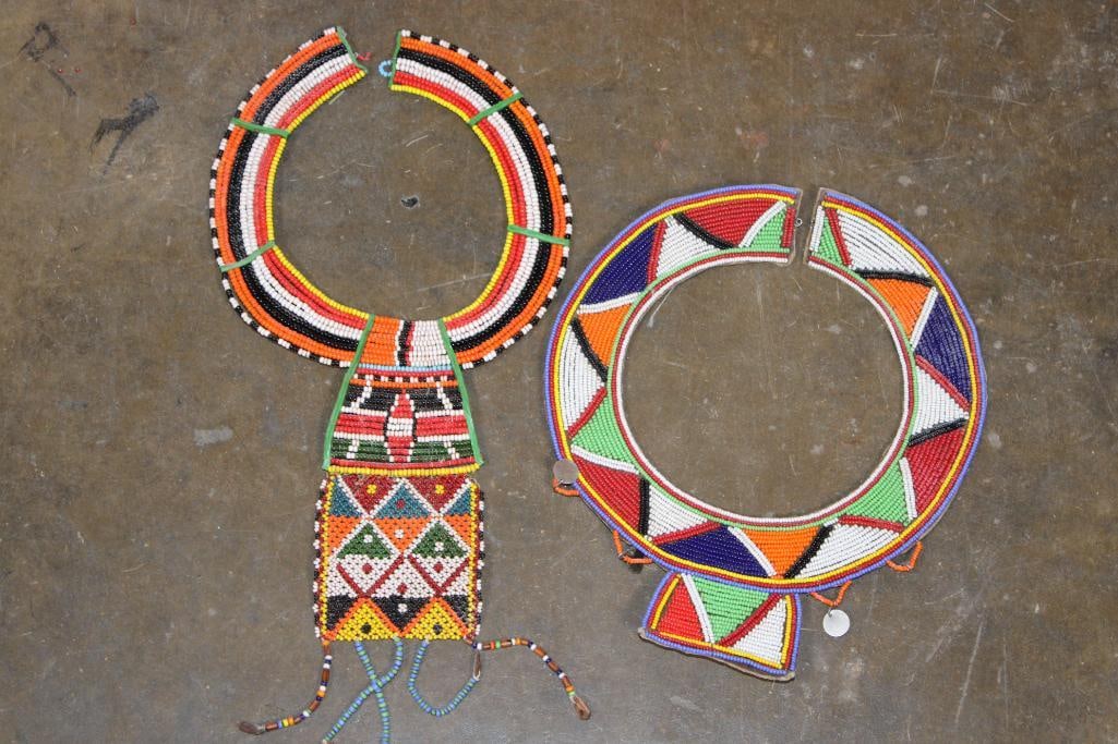 (2) Maasai Beaded NECKLACES from Kenya: Maasai Beaded NECKLACES from Kenya. These are often used in ceremonial occasions such as weddings. They are handcrafted using colorful glass beads arranged in intricate geometric patterns.