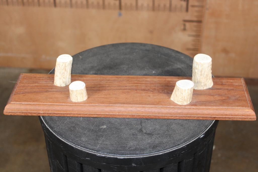 "Handmade by Hankinson" Wood and Antler KNIFE STAND for 2 Knives: "Handmade by Hankinson" Wood and Antler KNIFE STAND for 2 Knives. The space between the Antlers is 10" and the smaller space is 7.75" apart. The Total Knife Stand measures 16" Long x 4" Wide. KNIFE