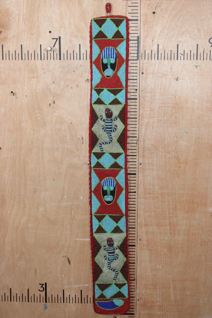 African YORUBA Beaded Sash or Panel from Nigeria: African YORUBA Beaded Sash or Panel. It was crafted from the Yoruba people of Nigeria. These sashes are significant ritual items, often worn by Ifa diviners (Babalawo) or high-ranking priestesses