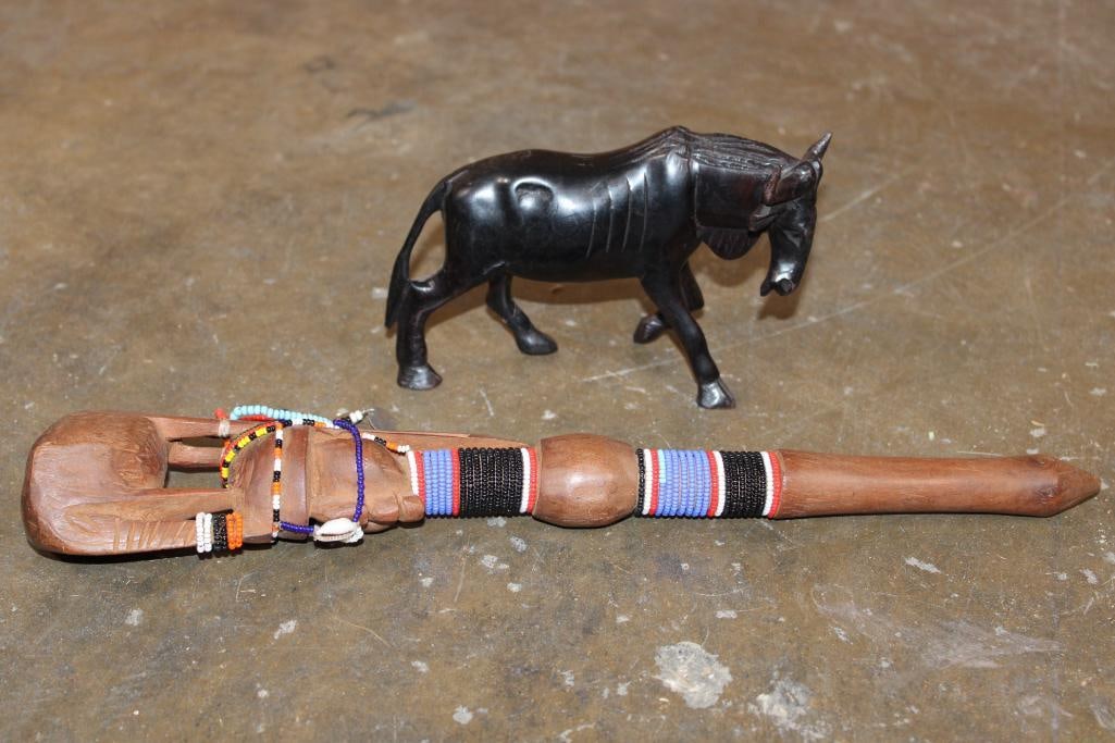 (1) African Ceremonial STAFF and (1) Hand-carved Wood Wildebeest Sculpture: 2 African Collectibles. Traditional wood carved African Ceremonial STAFF. These are often associated with the Nguni people or Sangoma (traditional healers) for ancestral communication. It measures