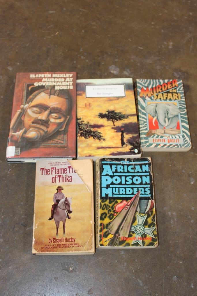 (5) Books by Elspeth Huxley: 5 Books by Elspeth Huxley. "Murder At Government House" 1988. "Red Strangers" 2000. "Murder on Safari" 1982. ""The Flame of Trees of Thika" 1985 (cover has been taped on). "The African Poison