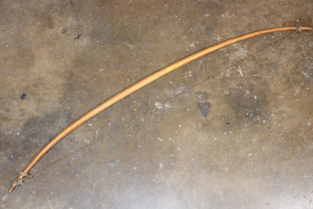 Traditional Wooden LONGBOW from Africa: Traditional Wooden LONGBOW from Africa. It measures 50" Long x 5" Wide. The string is Nice and Tight. AFRICAN ARTIFACTS BOWS AND ARROWS 