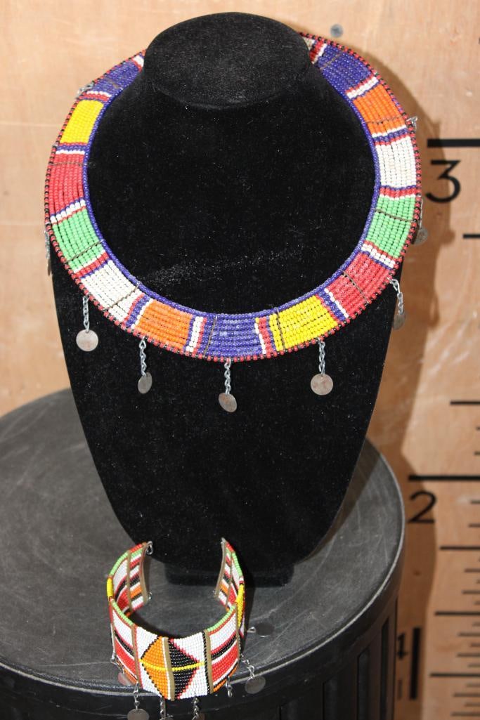 Vintage Handcrafted Beaded Maasai NECKLACE and BRACELET from Kenya: Vintage Handcrafted Beaded Maasai NECKLACE and matching BRACELET from Kenya. These collars are traditionally worn by married Maasai women to represent wealth and social status. COLLECTIBLE AFRICAN