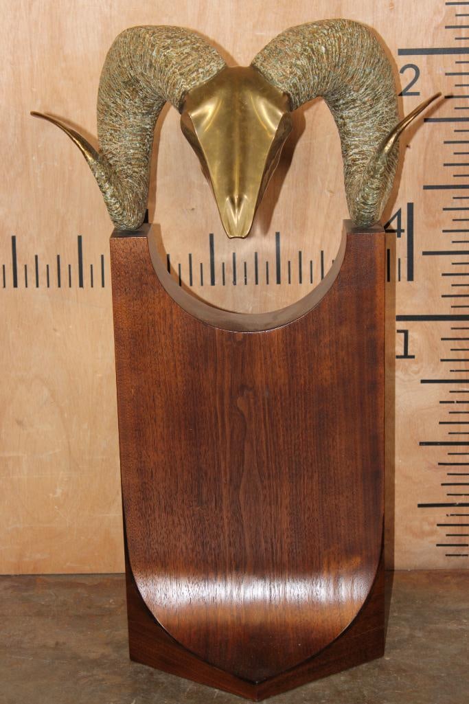 XL Collectible 1980s "Dolbi Cashier" Solid BRONZE RAM HEAD on a Hand-carved Wood Base: XL Collectible 1980s "Dolbi Cashier" Solid BRONZE RAM HEAD on a Hand-carved Wood Base. It measures 16" Wide x 26.25" Tall x 12" Depth and Weighs 26 lbs. The Ram Head is