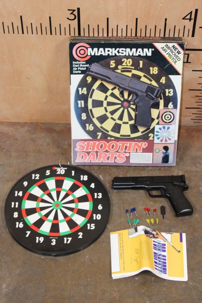 Marksman "Shooting Darts" Dart Board, Air Pistol, and Darts: Marksman "Shooting Darts" Dart Board, Air Pistol, and Darts. Everything you see is included, it has been lightly used. AIR GUNS AND AIR PISTOLS 
