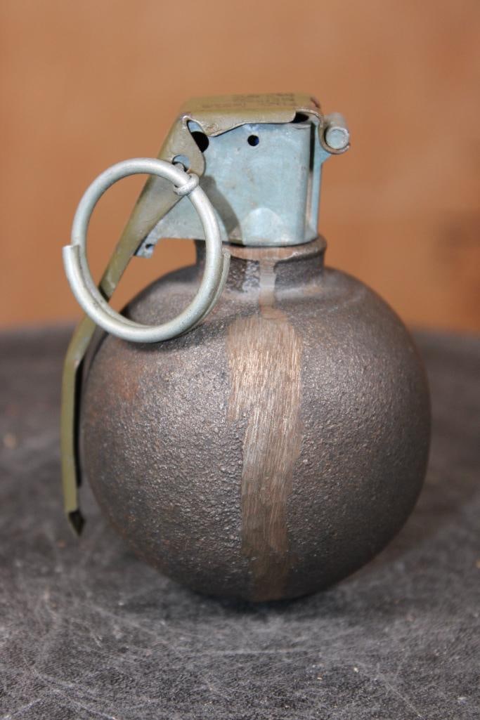 M67 Dummy GRENADE with a M213 Delayed Fuse: M67 "Baseball" Dummy GRENADE with a M213 Delayed Fuse. This is an Inert dummy grenade, it contains no explosive filler, live primer, or functional firing components. It is constructed from metal,