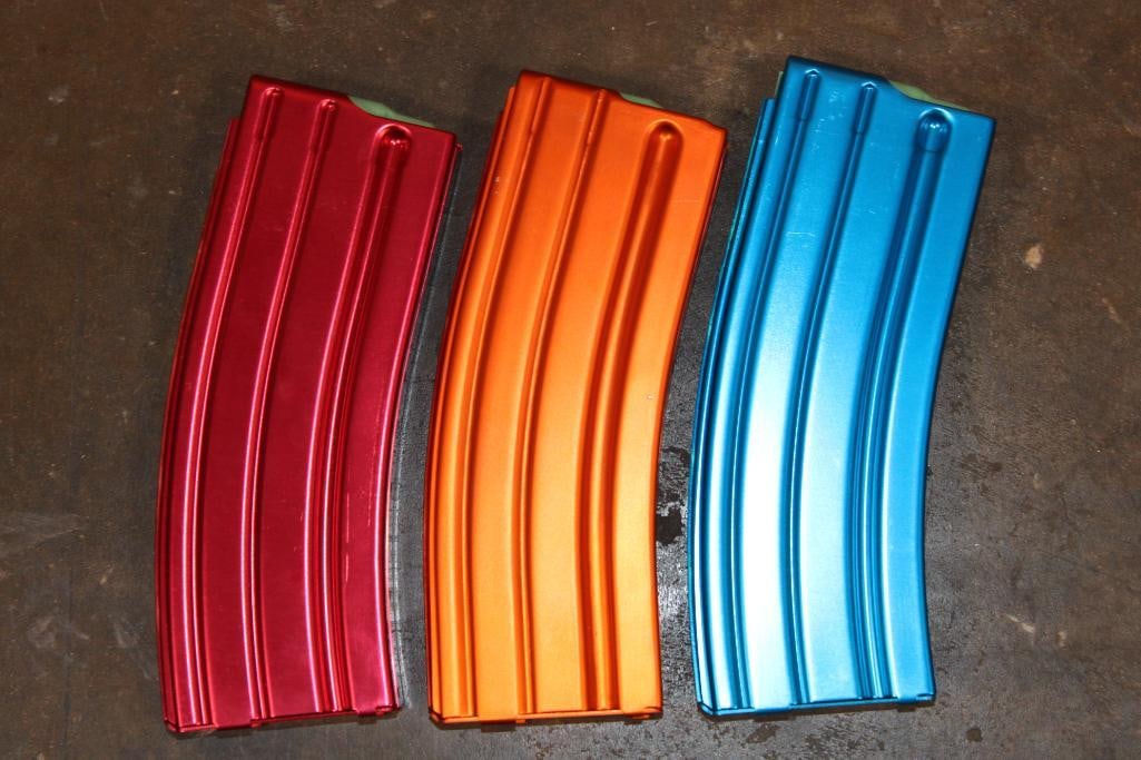 (3) .223 Aluminum AR-15 MAGAZINES: 1 Red, 1 Orange, and 1 Blue .223 Aluminum AR-15 MAGAZINE. They appear to be New. They are made from 6061-T6 aluminum and feature a hard-coat anodized finish. Colored magazines are frequently used to h