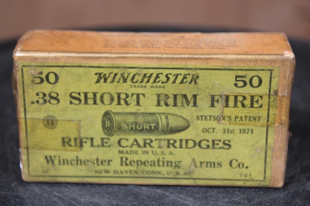 Full Sealed Box of 50 *Antique (circa 1921)* Winchester Repeating Arms Co .38 Short Rim Fire RIFLE: Full Sealed Box of 50 *Antique (circa 1921)* Winchester Repeating Arms Company .38 Short Rim Fire RIFLE CARTRIDGES. Stetson's Patent Green Label 1871, 7-21 Box Code. They are in Very Good Condition.