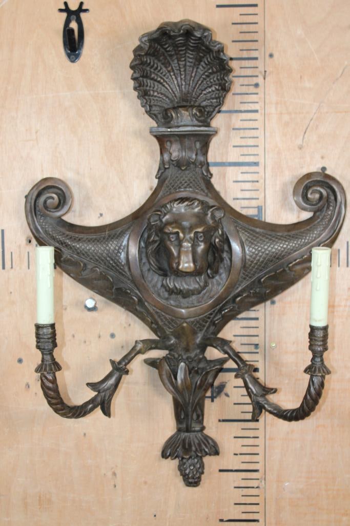 Large Bronze LION Wall Sconce Sculpture with 2 Candelabras: Large Neoclassic or Victorian style Bronze Wall Sconce featuring a prominent Lion Head and 2 antique-style (electric) candle holders. It measures 18.5" Wide x 27" Tall x 7" Depth and Weighs 21 lbs. It