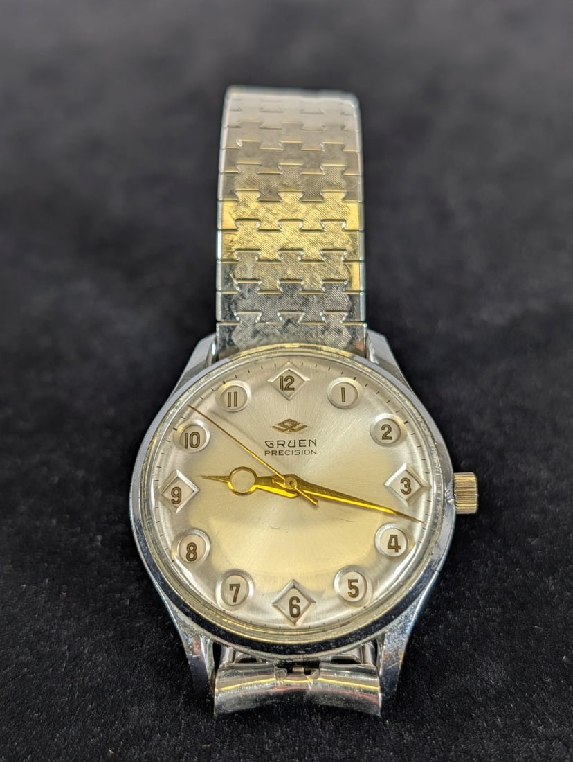 1960 Gruen Precision Airflight Jump Hour Pilot Watch: Mens mechanical watch with face that follows military time at 1pm; fully functional with crystal in excellent condition.