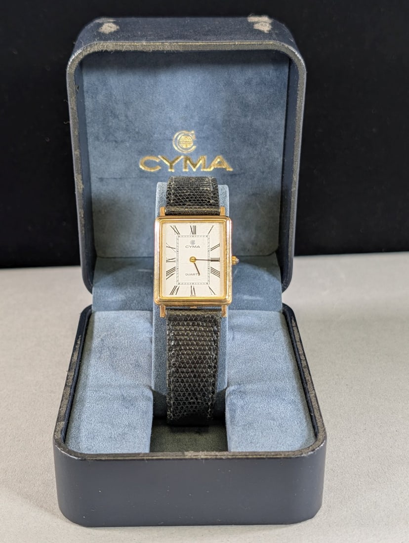 Swiss 14K Cyma Watch: Mens Tank style quartz watch with genuine lizard strap (worn condition) and 14K gold case.