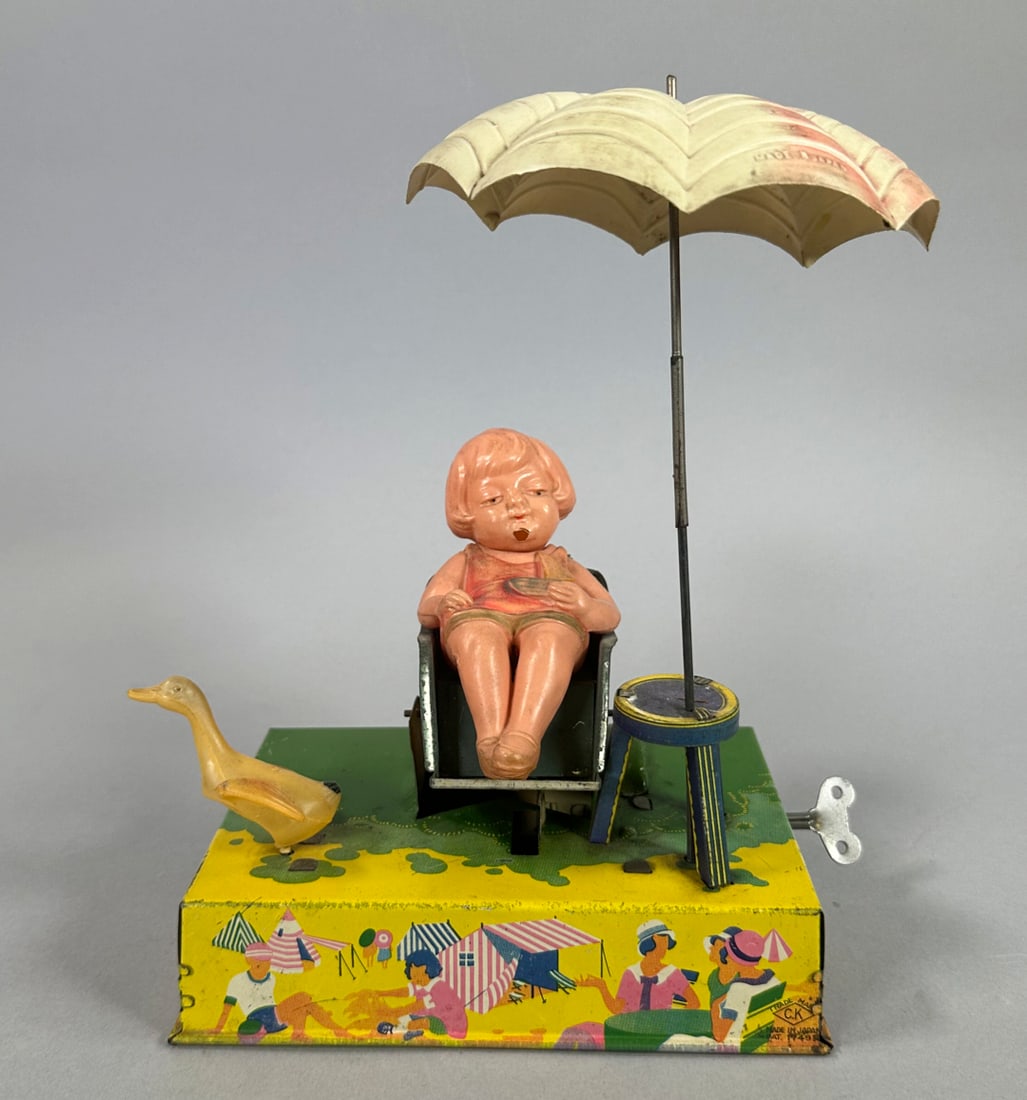 Vintage Wind Up Girl with Duck Tin Lithograph Japan Toy (1 of 3)