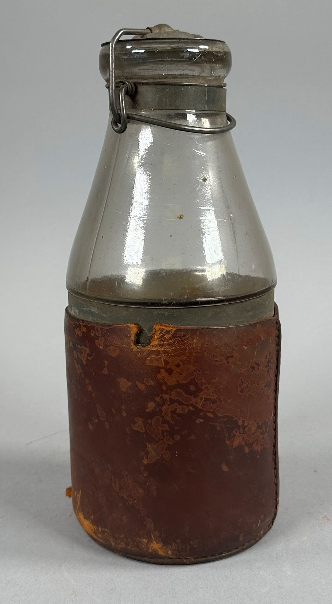 A. G. Smalley & Co. Bottle in A Leather Case: A. G. Smalley & Co. Bottle in A Leather Case Wear appropriate for its age.