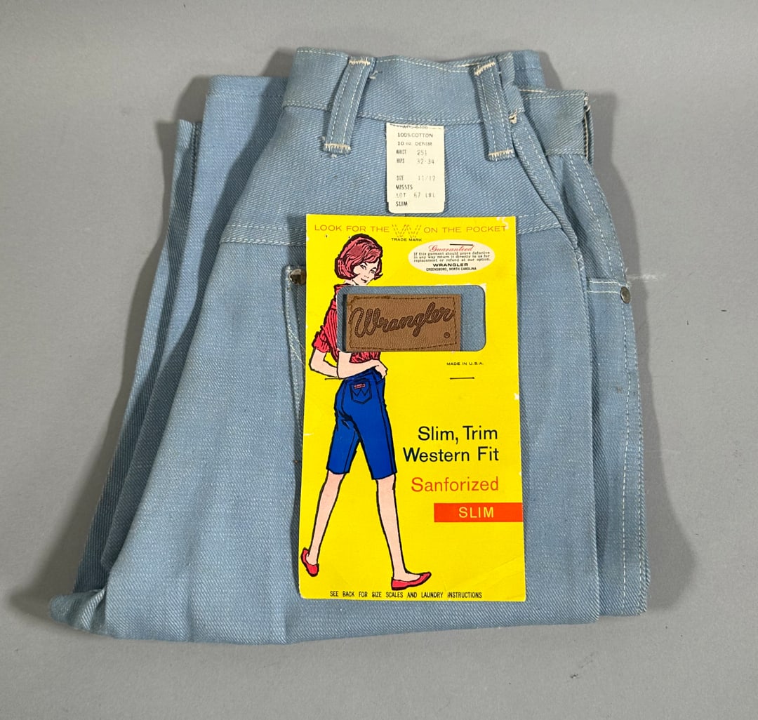 Vintage New With Tags Wrangler Ladies Long Shorts with Advertising: Vintage New With Tags Wrangler Ladies Long Shorts with Advertising Wear appropriate for its age.