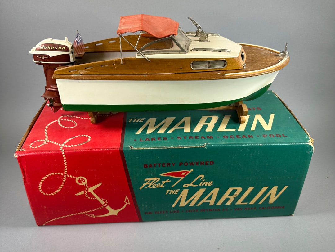 The Marlin Fleetline Speedboat in Box Has Motor: The Marlin Fleetline Speedboat in Box Has Motor Wear appropriate for its age.