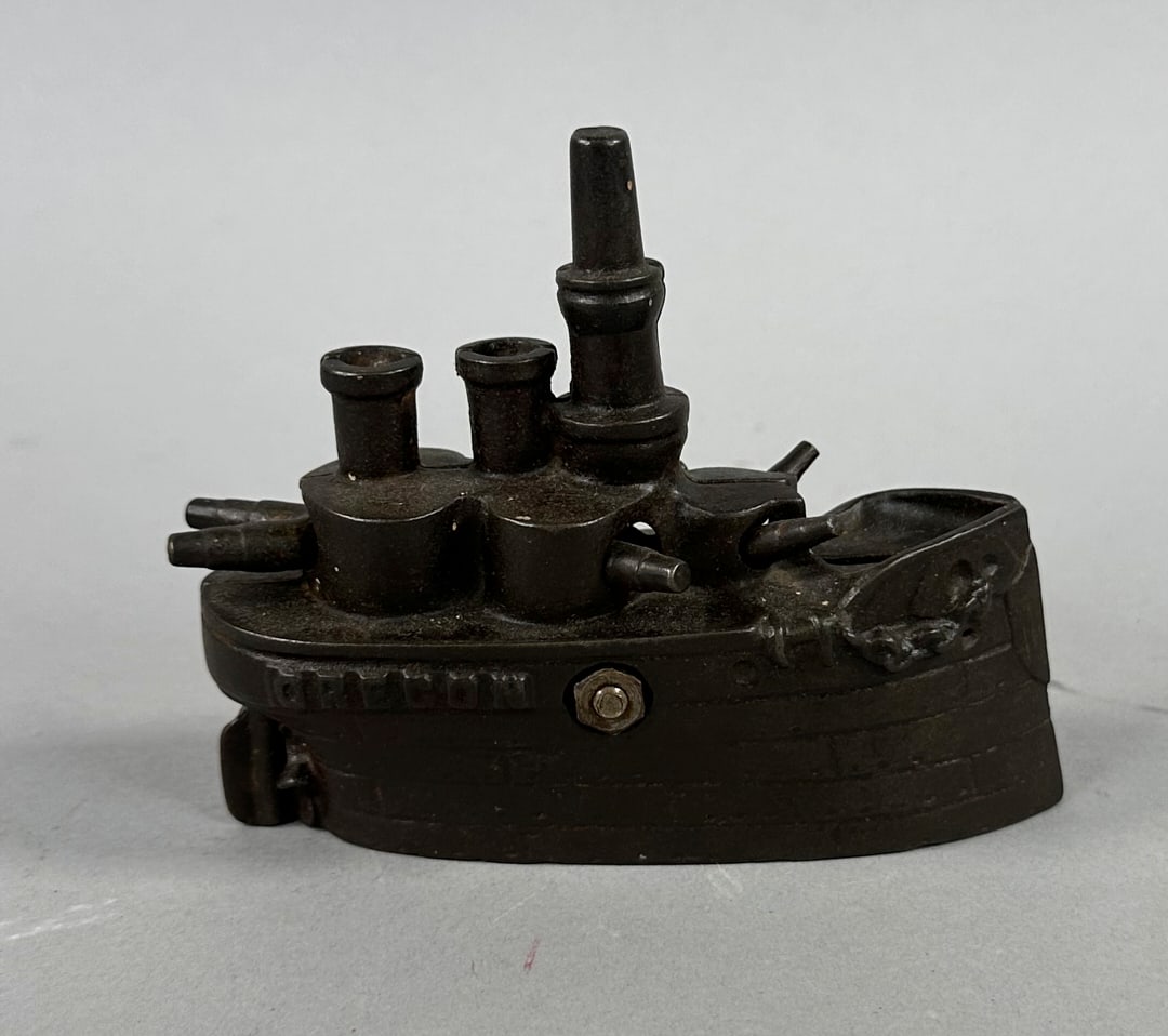 Oregon Battleship Cast Iron Bank: Oregon Battleship Cast Iron Bank Wear appropriate for its age.