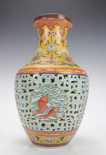 A Chinese Famille Rose Fishes Porcelain Vase: A Chinese Famille Rose Fishes Porcelain Vase, Qing Dynasty with Qianlong Mark, Size: 41*25cm.