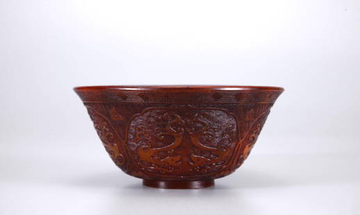 A Chinese Horn Carving Dragons Bowl: A Chinese Horn Carving Dragons Bowl, Qing Dynasty, Size: 5.5*12.2cm, Weight: 212.3g.