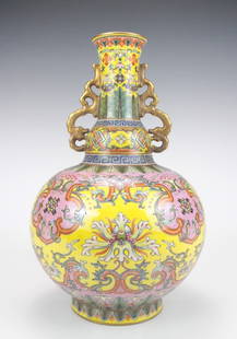 A Chinese Gilted Famille Rose Lotus Porcelain Vase: A Chinese Gilted Famille Rose Lotus Porcelain Vase, Qing Dynasty with Qianlong Mark, Size: 33*22cm.