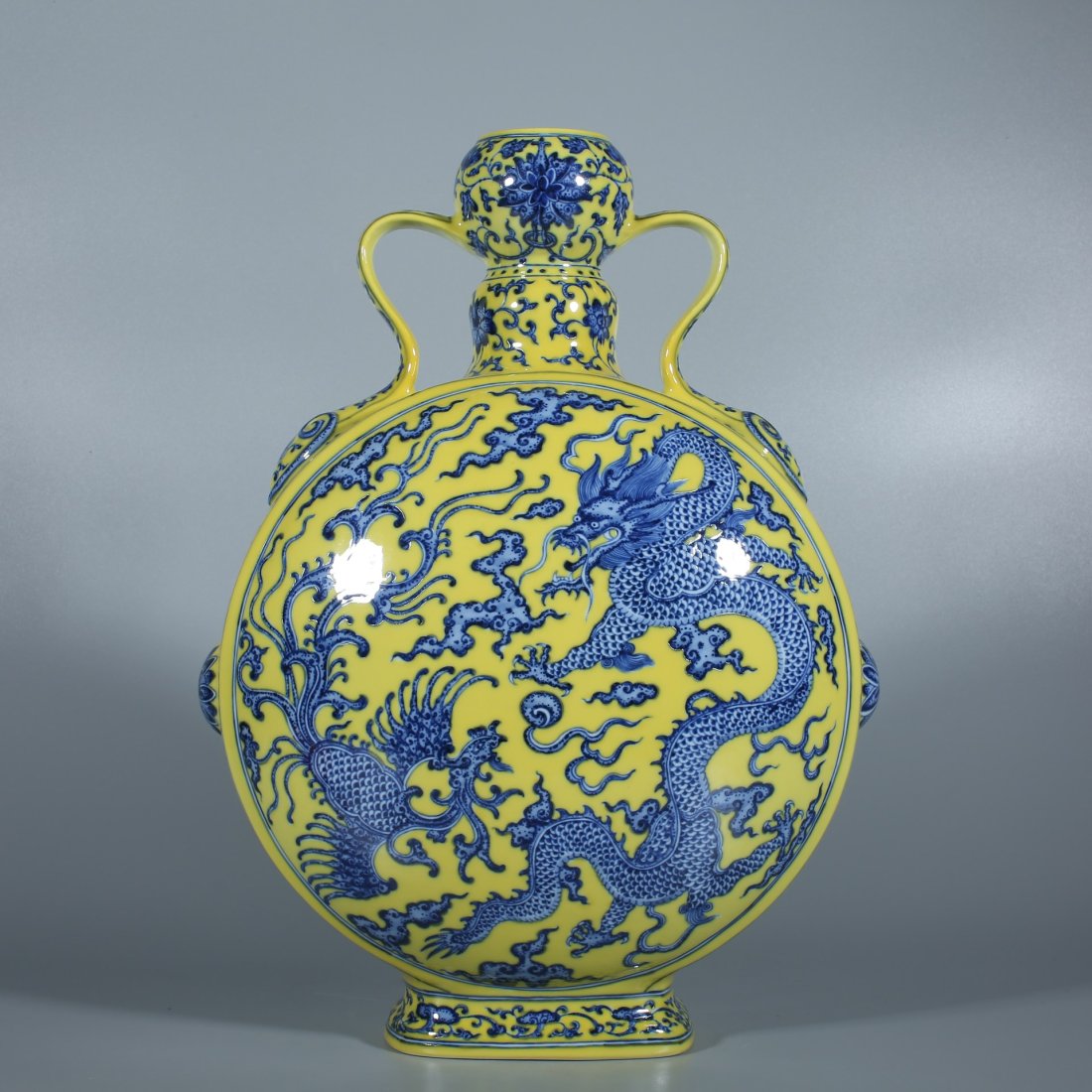 A Chinese Yellow Ground Blue Dragon and Phoenix Porcelain Vase (1 of 9)