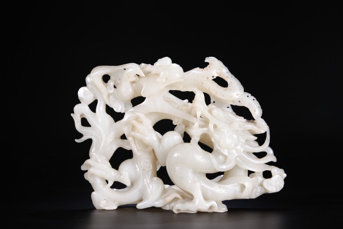 A Chinese He Tian White Jade Dragon Ornament (1 of 9)