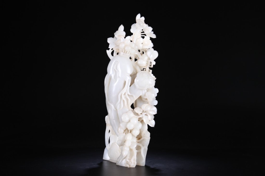 A Chinese He Tian White Jade Flowers Ornament (1 of 9)