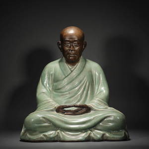 Sitting statue of Arhat in Longquan kiln of the Qing Dynasty