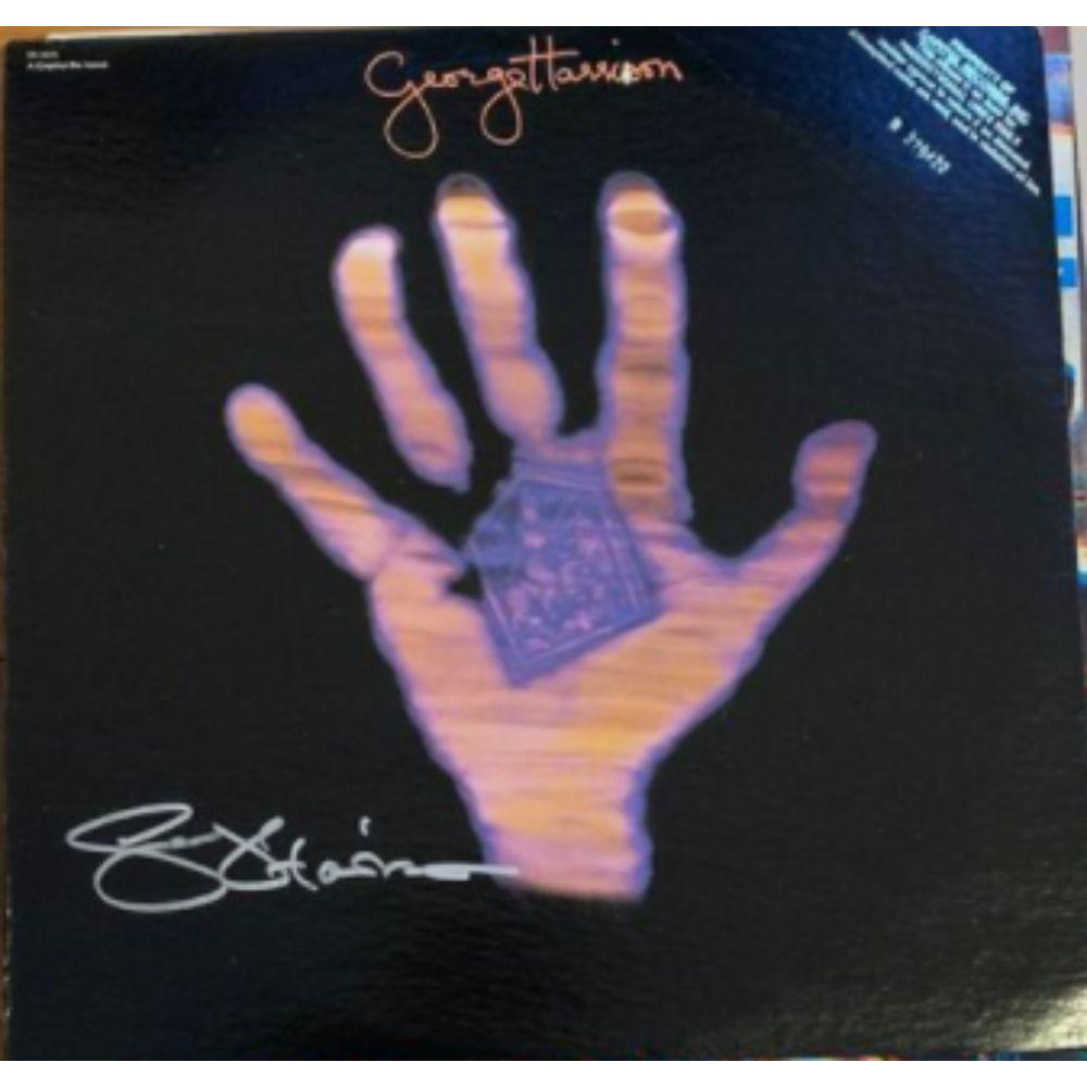 Signed George Harrison Living In The Material World: Signed by George Harrison