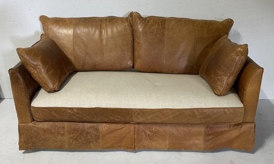 Designer Leather Sofa: Designer leather sofa with upholstered seat. No stains and cushions are very comfortable