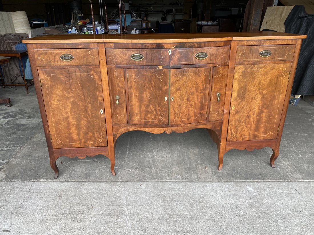 Inlaid Southern Sideboard on French Feet: Fine inlaid southern sideboard on French feet. Walnut and Mahogany. 19th century. Family history of coming from Tennessee.