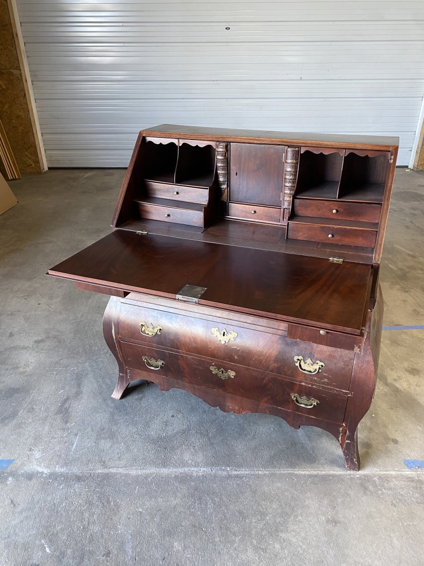 19th Century Dutch Mahogany Desk: 19th century 2 part Dutch mahogany desk with fitted interior and leather faux booksWidth: 42 1/2"Depth: 21 3/4" Height: 44"