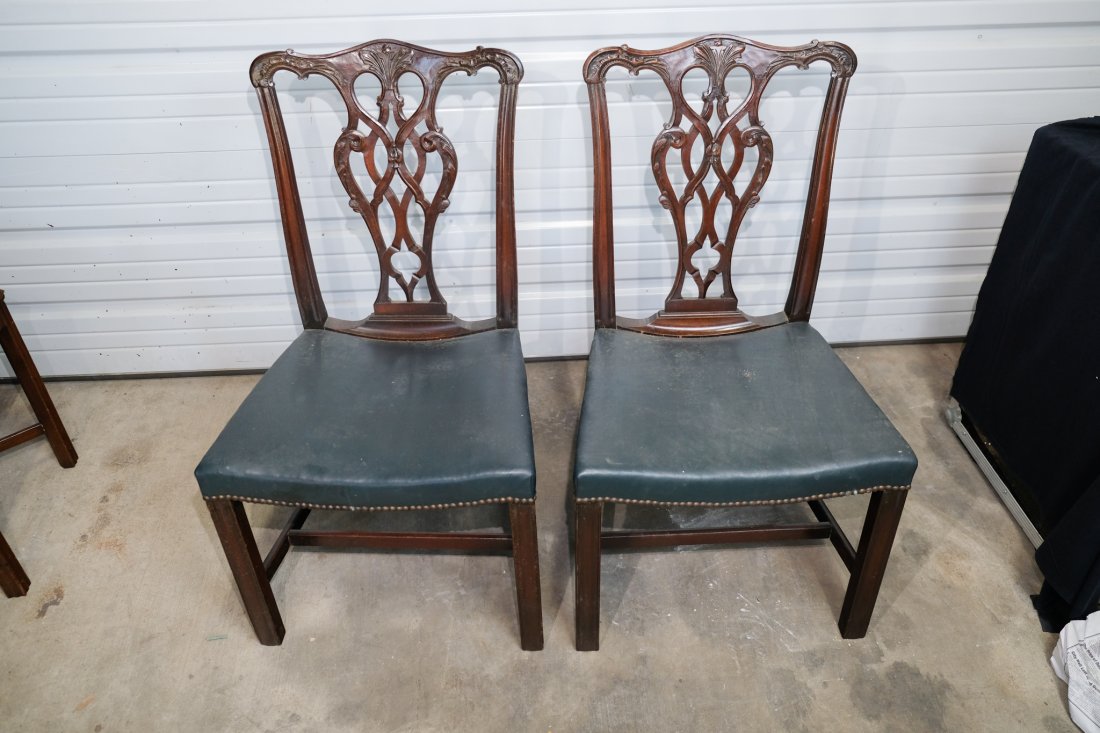 Pair of Antique Carved Georgian Mahogany Chairs, probably 18th Century: Pair of Antique Carved Georgian Mahogany Chairs with dovetailed stretcher, probably 18th Century..Height: 38”Width: 21 1/2”Depth: 18”