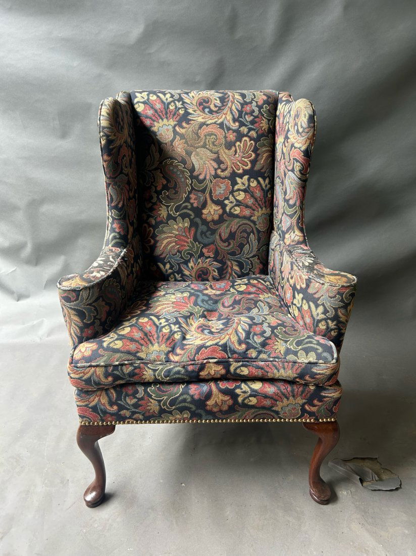 Needlepoint upholstered wingback chair: Needlepoint upholstered wingback chair - some fraying and losses