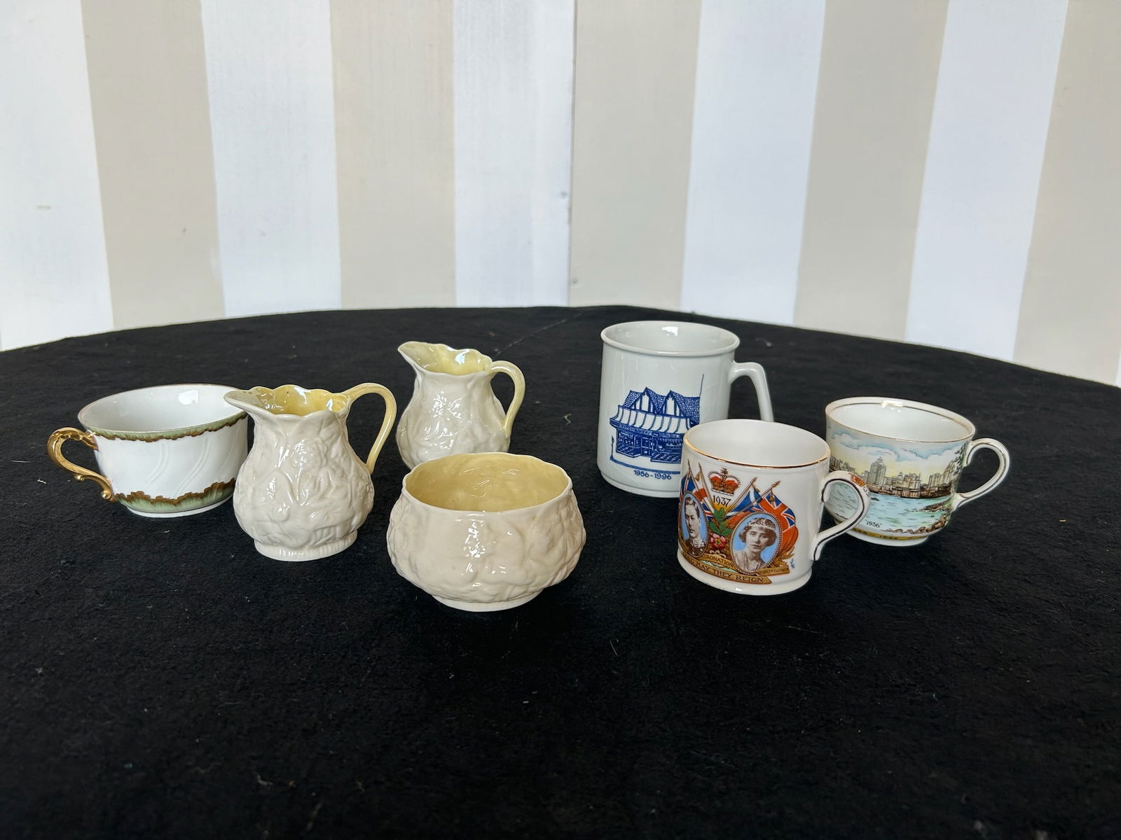Miscellaneous box lot of porcelain cups and creamers: Miscellaneous box lot of porcelain cups and creamers- A Josh favorite. He may even buy one of the coffee cups off of you.