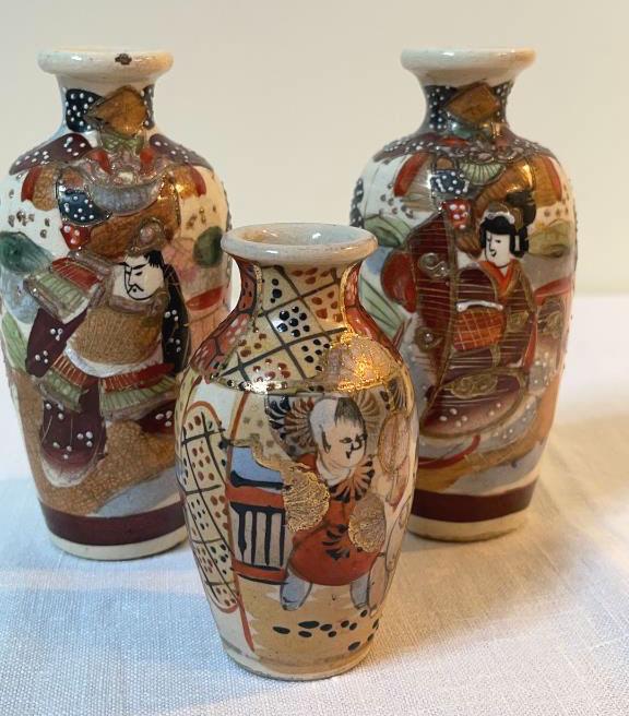 Three Mini Satsuma Vases: Pair of Miniature Meiji period satsuma vases. Figurines of men & women dressed in traditional clothing. Vibrant red and gold. Two 5 tall, one 3.5 tall