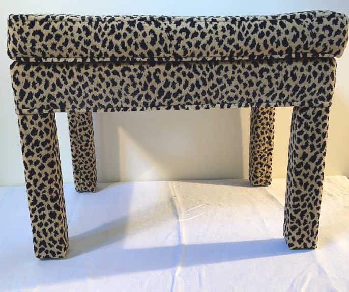 Leopard Print Upholstered Stool: 22.5 X 17 X 18 tall. Six button tufted top. Good condition, some wear.